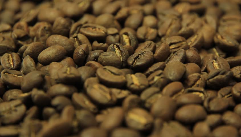 Fragrant fried coffee beans falling
