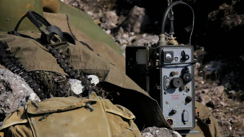 Military transmitter. Military transmitter is close to a military ammunition. Motion zoom.