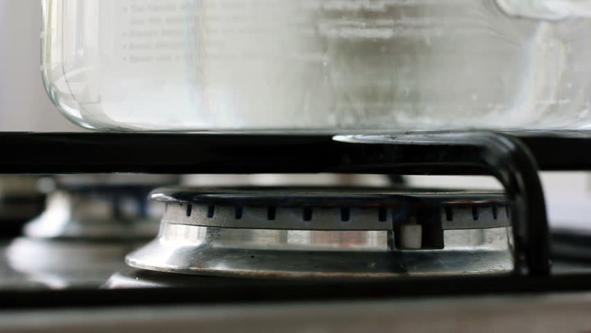 Boiling water on a stove.