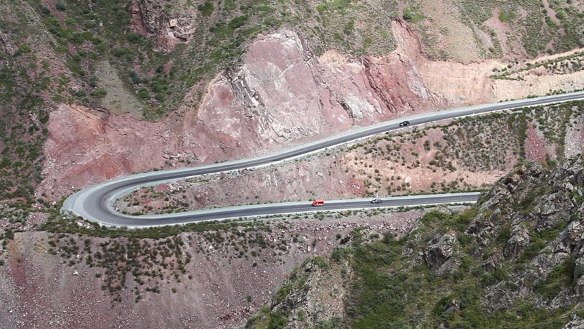 Winding road. Car on a bend.