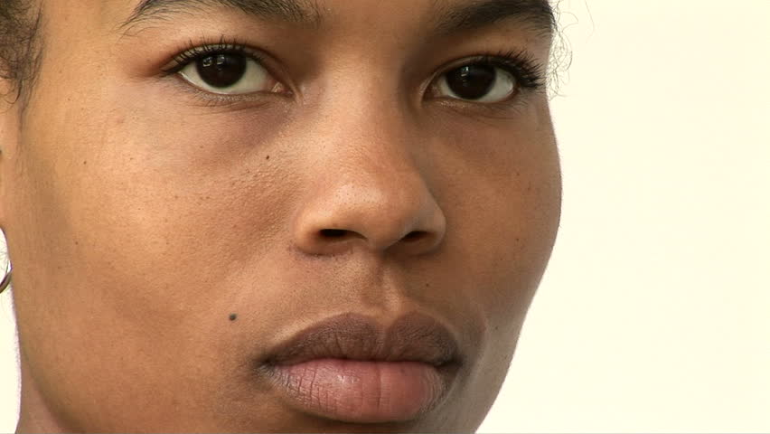 Portrait of young African American woman with pierced ears