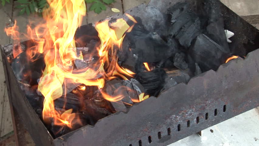 Coals burning in a BBQ