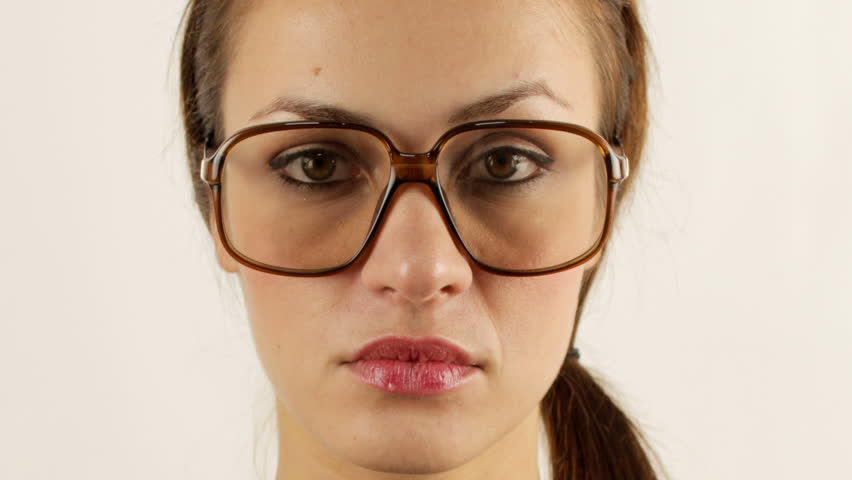 Stop-motion of a beautiful stylish woman, wearing different glasses