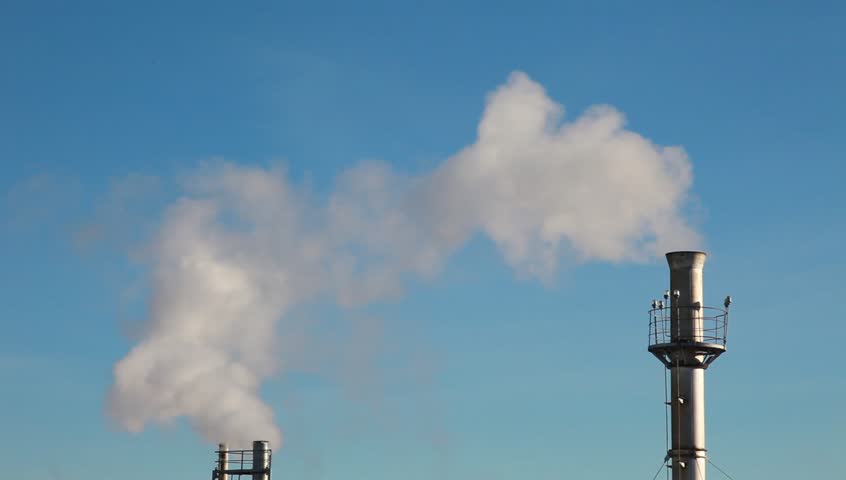 Chimneys releasing a fantastic amount of smoke. Ideal image to highlight climate change, global warming and greenhouse issues.