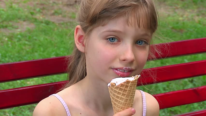 Child Eating Ice Cream Outdoor. Stock Footage Video 2587352 EC5