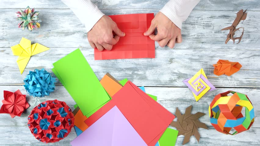 Male Person Creating Origami Object Stock Footage Video 100 Royalty Free 1010409107 Shutterstock