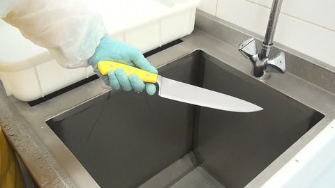 Cleaning Kitchen Chopping Knife From Stock Footage Video 100