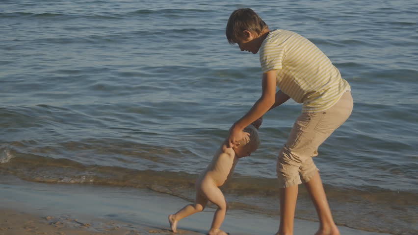 Walking Nude - Teenager and Child Having Fun Stock Footage Video (100% Royalty-free)  1013029937 | Shutterstock