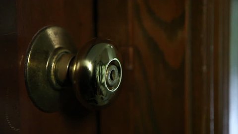 Close Up Shot Of A Door Knob As A Pair Of Gloved Hands Holding Lock Picking Tools Enter Frame Pick The Lock And Open The Door