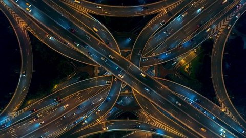 Yananlu Road overpass bridge with traffic at night aerial view from drone in Shanghai, China.