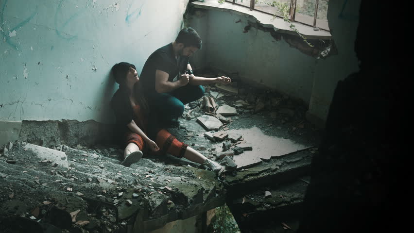 Drug Addicted People Taking Heroin In An Abandoned Building Stock ...