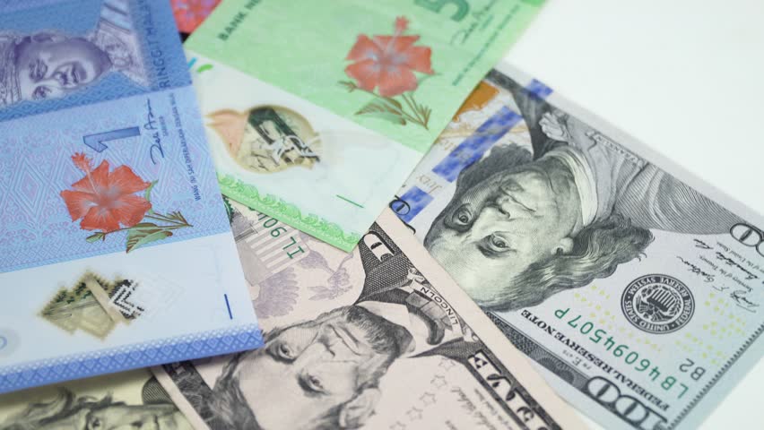Us Dollar And Malaysia Money Stock Footage Video 100 Royalty Us Dollar And Malaysia Money On The Table Rotating 4k
