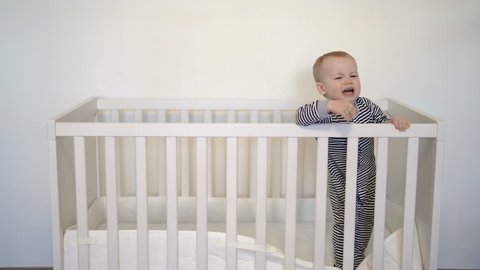 Baby Standing In A Crib Stock Footage Video 100 Royalty Free