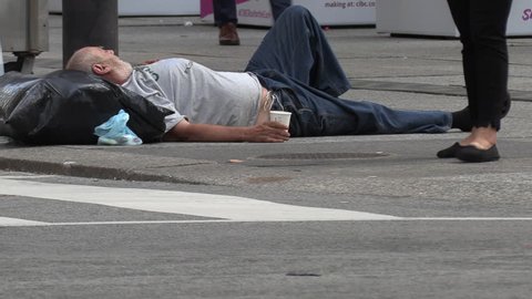 Toronto, Ontario, Canada April 2019 Homeless Person the Streets Of Wealthy Financial District