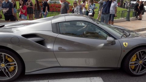 Monte Carlo Monaco May 1 2019 Man Driving His Gray Ferrari 488 Gtb Spider In Front Of The Monte Carlo Casino In Monaco French Riviera France Europe 4k Video