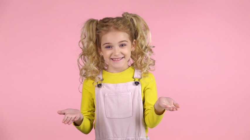 Hd01 00cute Little Girl With Blond Curly Hair In Two Ponytails Is Inviting To