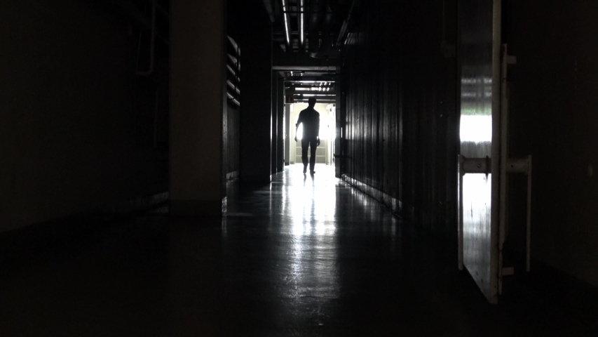 Man Walking In Dark Corridor Stock Footage Video 100 Royalty