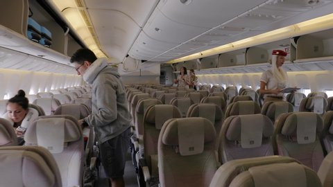 Dubai United Arab Emirates Circa 2018 Cabin Interior On Economy Class Of Emirates Boeing 777 300 Aircraft During Boarding Process First Person Point Of View Looking For Seat