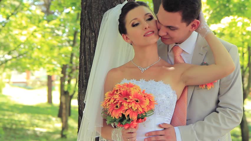 Newly Married Kissing On Tropical Beach After Sunset Newlyweds Embracing Each Other In A Park Hd Stock Video Clip