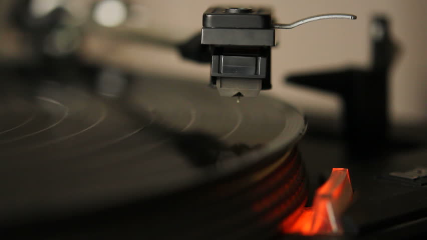 Close Up HD Movie Of A Record Player Playing A Vinyl Black Record. The ...