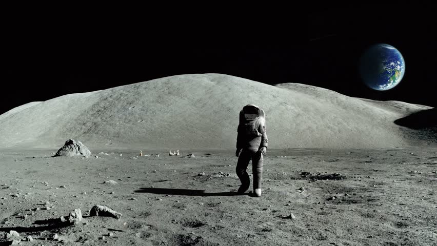 Stock Video Clip of Astronaut walking on the moon | Shutterstock