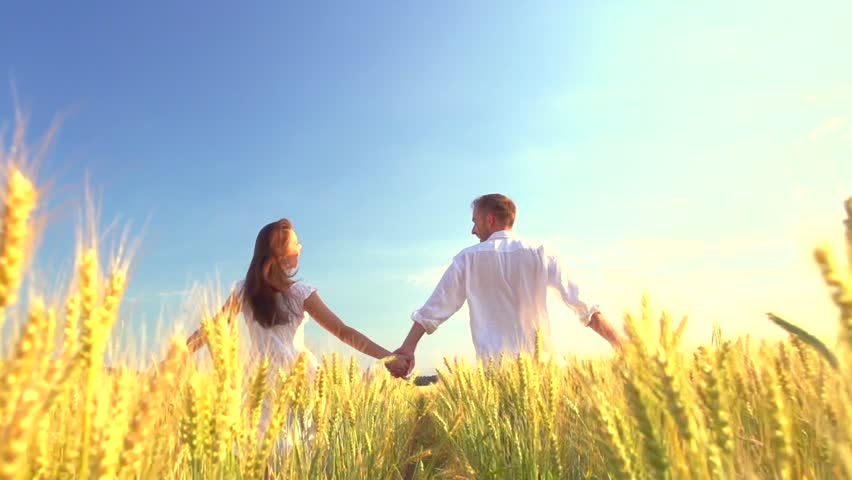 Having a field day. The best photos of the world of a couple in a yellow green field germany.