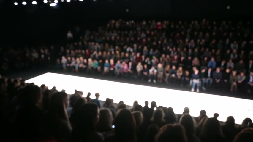 Out Of Focus Background, Models Walk The Runway During Fashion Show ...