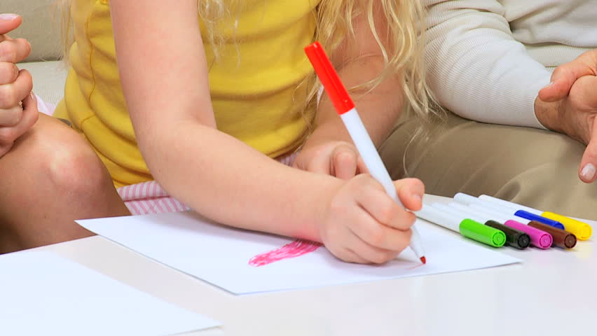 Stock video of cute little caucasian girl crayoning a | 1275037 ...