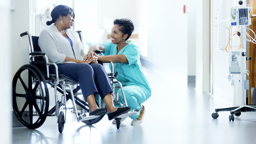 African American Empathy Female Nurse And Disabled Patient Consult In ...