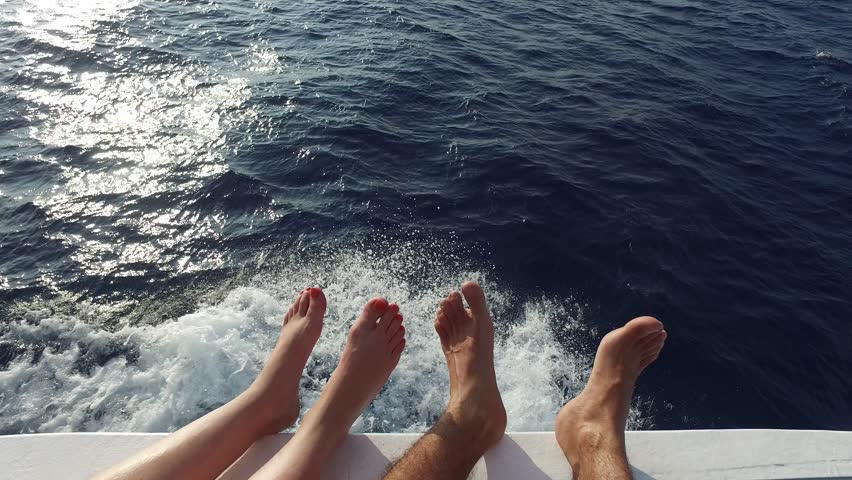 Image Of Sexy Legs Of A Young Woman In Marine Cruise Lying On The Deck