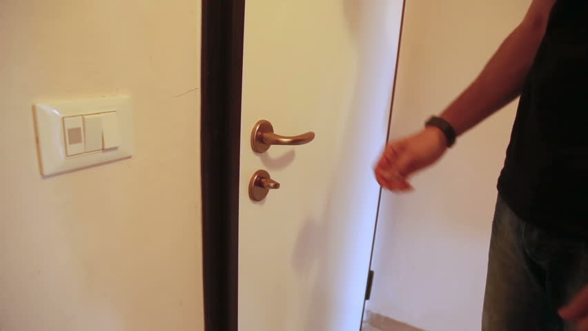 Hd00 10man With Black T Shirt Is Opening The Door Of His House And