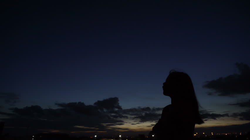 Silhouette Of Woman Looking Up Stock Footage Video 100