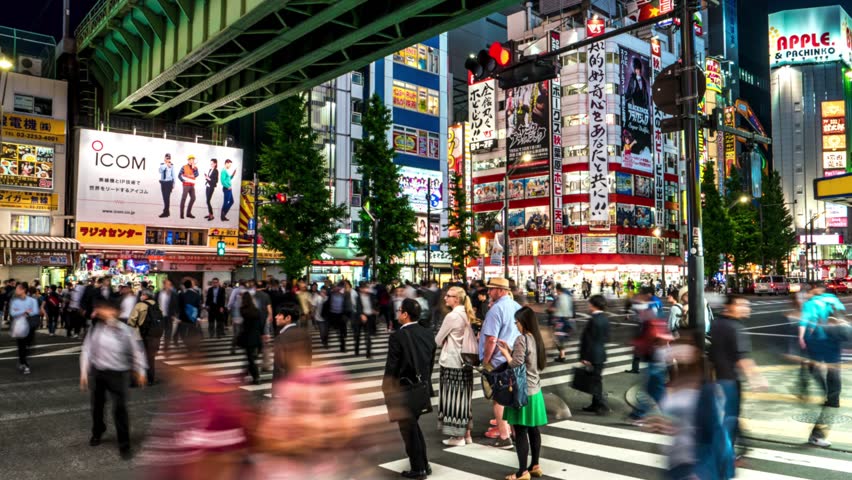 Tokyo - May 2016: Night Street View With People Crossing Street At 