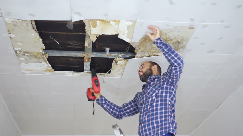 Man Repairing Collapsed Ceiling Ceiling Stock Footage Video