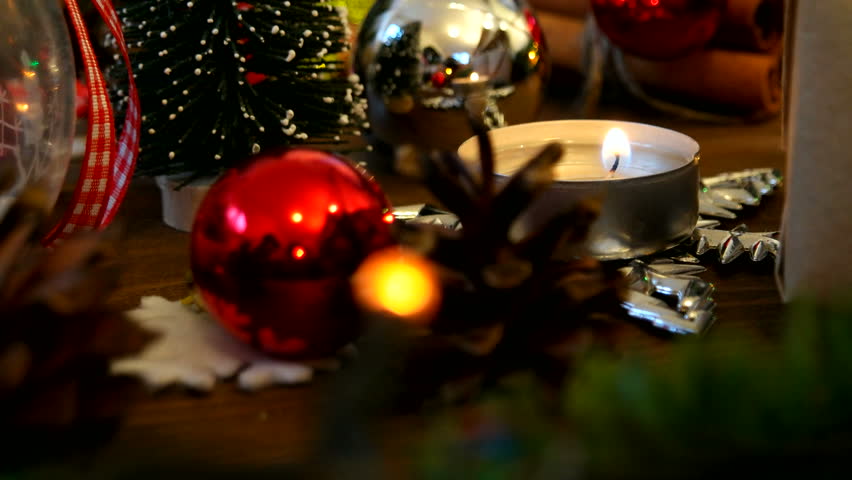 Beautiful Christmas Scene Of Burning Red Candles Surrounded By Festive ...