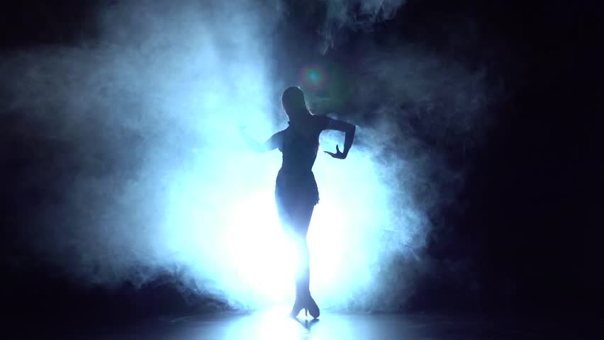 Graceful Girl Dancing In Studio, Silhouette. Dark Background, Blue ...