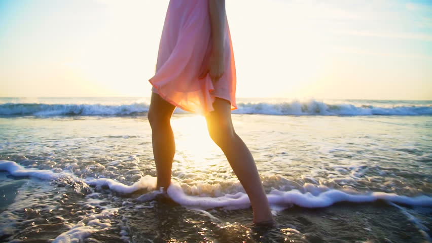 Legs Of Hispanic Girl Walking Barefoot Wet Sand Island Beach Sun Lens