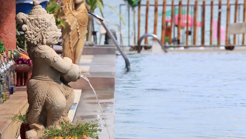 Traditional Thai Sculpture With A Stock Footage Video 100 Royalty Traditional Thai Sculpture With A Fountain On The Beach Near Swimming Pool Sea