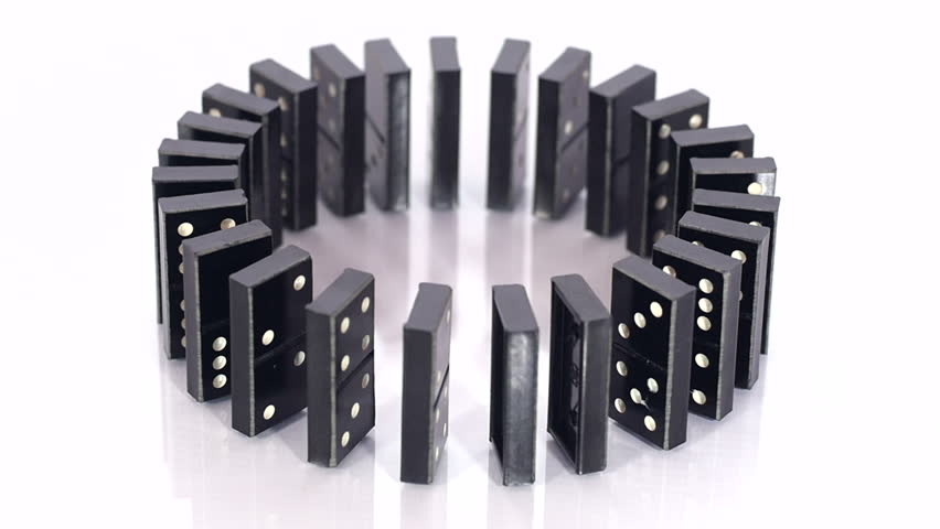 Domino Pieces Falling In A Spiral On Black Table Stock Footage Video ...