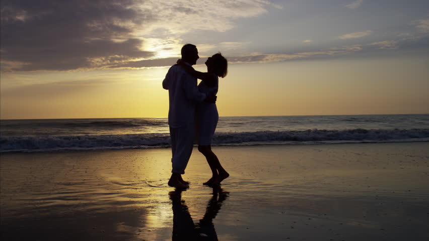 Couple Silhouette At The Beach. Sunset Light. Stock Footage Video ...