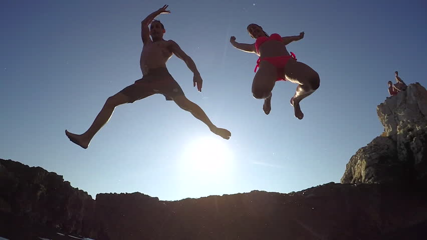 Man has terrible Jump off Ledge. Slow Motion man.