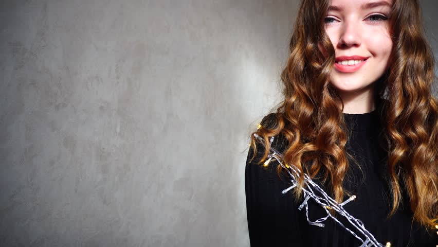 4k00 07girl With Long Curly Brown Hair Sitting In White Room With