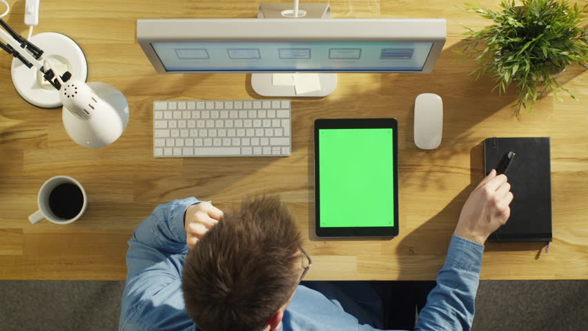 Typing On A Laptop On A Busy Desk, Top View, MS Stock Footage Video ...