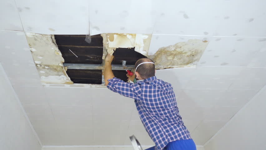 Man In Respirator Cleaning Mold Stock Footage Video 100 Royalty Free 24793187 Shutterstock