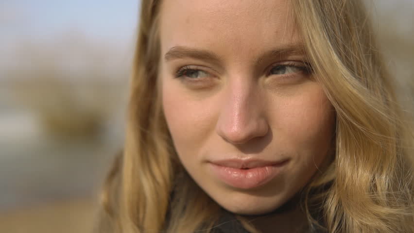 Portrait Of Smiling Beautiful Blonde With Braces Stock F