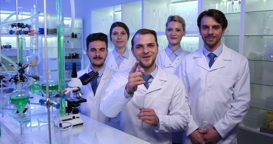 researchers group showing ok sign success experiments laboratory laboratory presentation