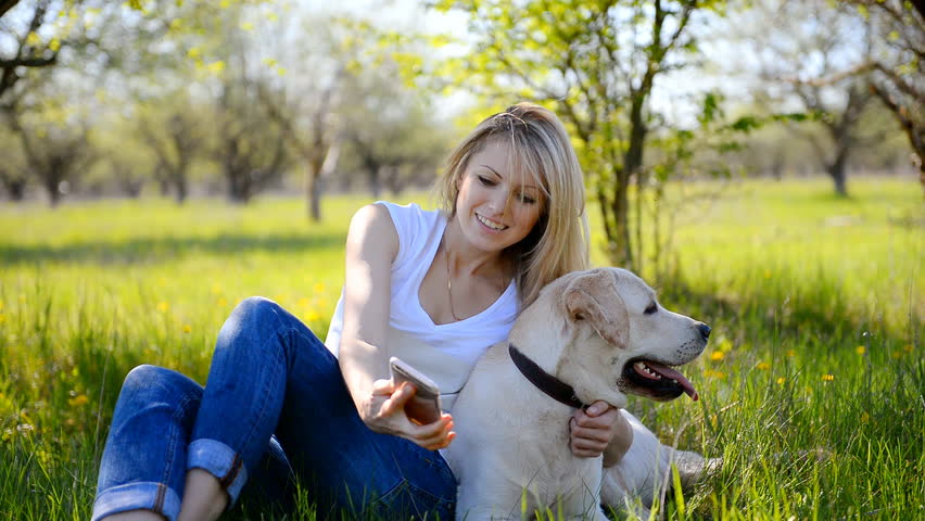 Little Girl Stroking Dog In Park, Looking Each Other Stock Footage ...