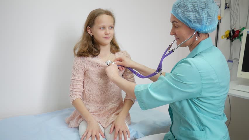 Child At The Doctor,Passes Medical Examination. Stock 