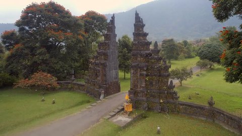 Rising Aerial View Of A Typical Balinese Religious Split Gate Candi Bentar In The Early Morning