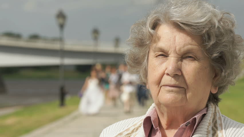 Half Face Of Serious Mature Old Woman With Gray Hair Aged 80s Outdoors ...